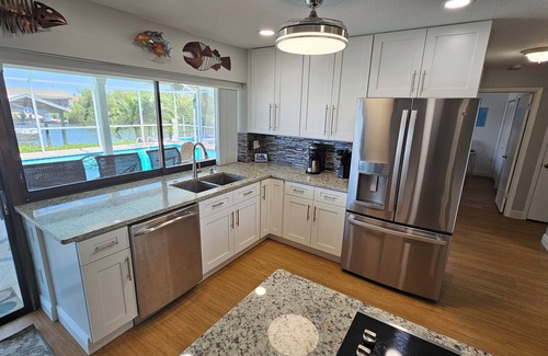 Apollo Beach House | Tropical Waterfront Pool Home, Private Dock, Kayaks, Direct Access to Tampa Bay!