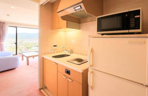 Kominato Onsen House | Twin 69 square meters All rooms have an ocean vi / Kamogawa Chiba