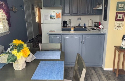 Manitou Beach-Devils Lake Cottage | Two Bed Rooms with a sunrise lakefront view