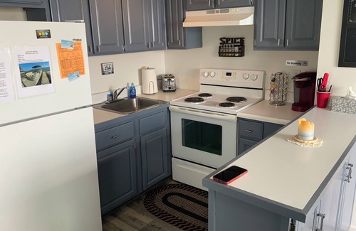 Manitou Beach-Devils Lake Cottage | Two Bed Rooms with a sunrise lakefront view