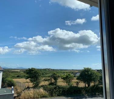 Caergeiliog House | Two bedroom house with enclosed gardens and 2 car drive