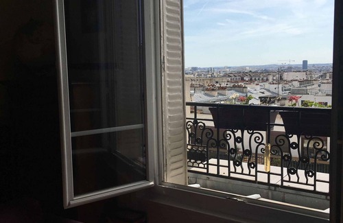 11th Arrondissement Apartment | Typical Parisian apartment 56 m2 at Père Lachaise - balcony view of all of Paris