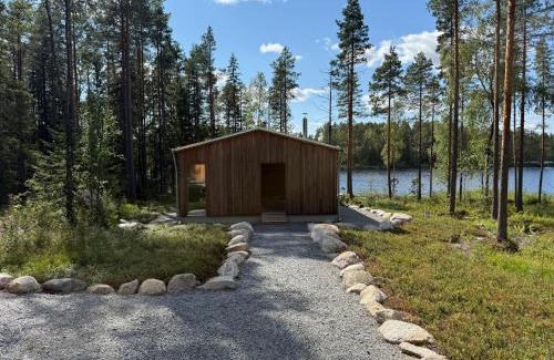 Soini Villa | Ulvontähti - moderni mökki järven rannalla