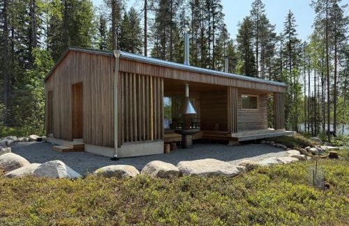 Soini Villa | Ulvontähti - moderni mökki järven rannalla