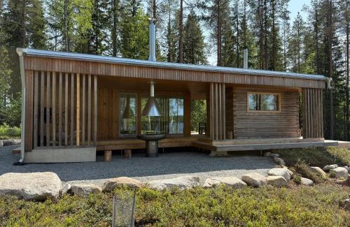 Soini Villa | Ulvontähti - moderni mökki järven rannalla