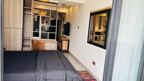 Central Province Apartment | UN approved snug studio with gym