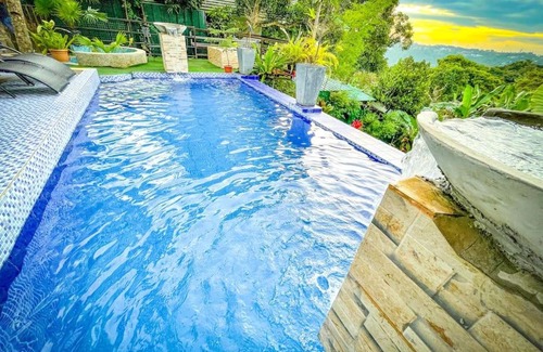Tagaytay Apartment | Unique Vacation House in Tagaytay with Pool (up to 14 Pax)