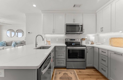 Fort Bay Condo | Updated Latitude 29 #34 Beachfront w/Pool, Hot Tub & Grills! Free Golf & Tix!