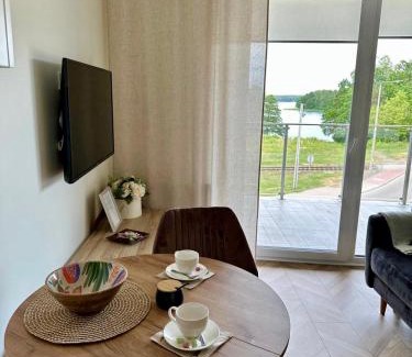 Augustow Apartment | Urokliwy Apartament z dużym tarasem i widokiem na Jezioro Białe