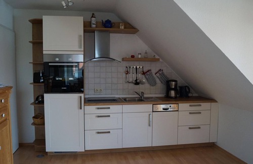 Werdum Apartment | Vacation apartment no.: 2 Fireplace - Haus Friesentraum