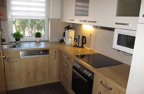 Timmel House | Vacation home Conny with bathing jetty and rowing boat