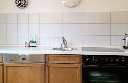 Reutin House | Vacation home Köchlin - charming semi-detached house with garden and parking space