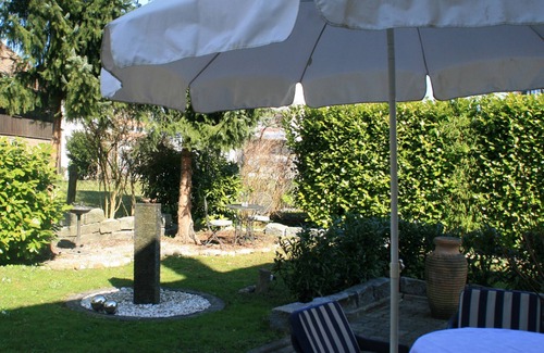 Reutin House | Vacation home Köchlin - charming semi-detached house with garden and parking space