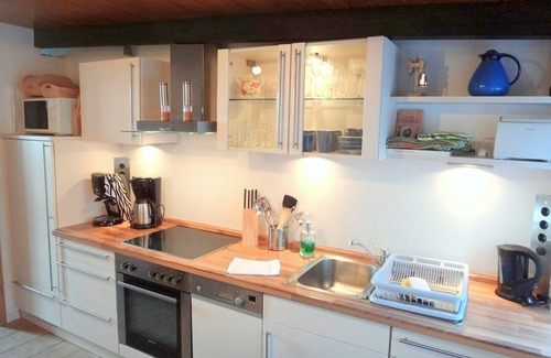 Ellenberg House | Vacation in the listed thatched-roof half-timbered house "Rikate" in Kappeln on the Schlei, high-quality and with a view of the Schlei in the home of the country doctor