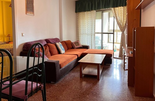 Retamar Apartment | Vibrant apartment in Retamar with garden