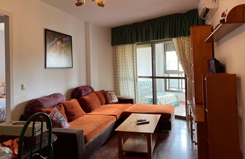 Retamar Apartment | Vibrant apartment in Retamar with garden