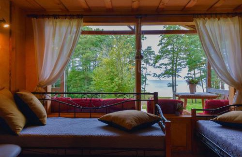 Jurkalne House | Viesu māja "Ozoliņi"