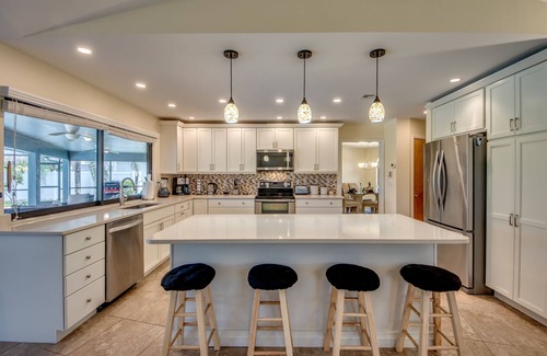 Lochmoor Waterway Estates Villa | Villa Journey - newly renovated, large pool, adjoining small park with lake