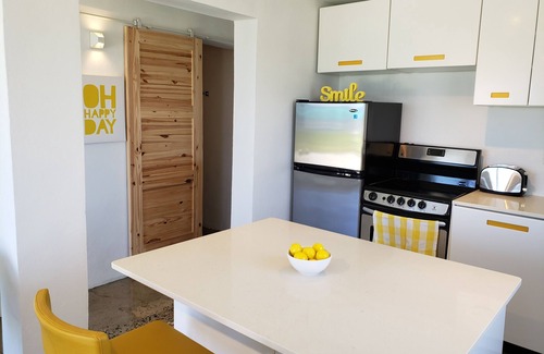 Cockburn Town House | Villa Kaya - Yellow Suite W/Golf Cart - Ocean Front