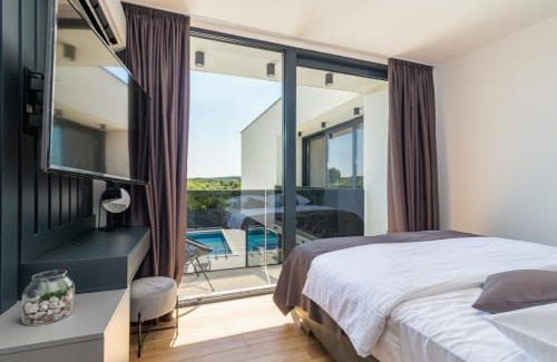 Medulin Villa | Villa Miaa newly built modern villa in Medulin for 9 people with heated swimming pool & jacuzzi