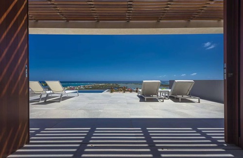 Orient Bay Villa | VILLA Ô, luxurious 4-bedroom villa with mirror pool and sea view