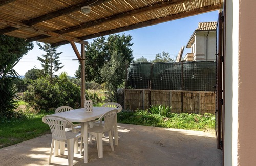 Masainas Villa | Villa "Orchidea" with Garden, Terrace, Balcony & Air Conditioning