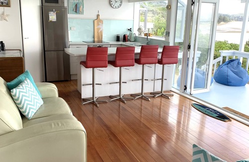 Red Beach House | Vintage Retro style Bach with stunning sea views