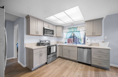 Rancho del Rey House | VRBO/Expedia: River Ash Retreat-4BD Getaway w/Arcade & Backyard