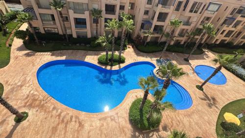 Soualem Trifiya Apartment | Vue piscine et accès rapide à la plage