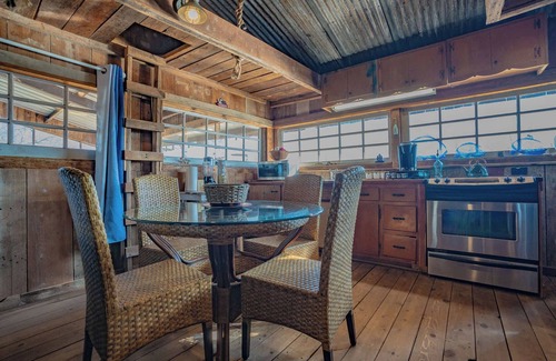 Satin House | Waco Rustic Boat House, River Fishing, Sunset Views