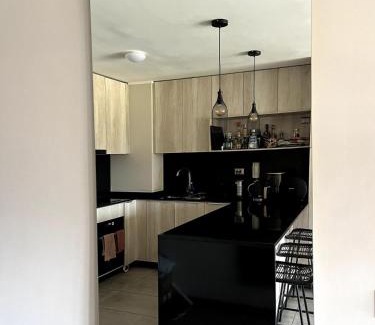 Las Condes Apartment | Warm, Central and Modern Apartment