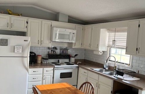 Aurora House | Water Front Home with Private Dock on Bond Creek