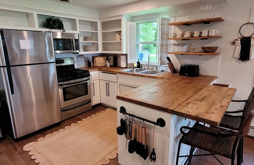 Green Bay House | Waterfront Cottage with a sand beach!