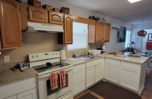 Hudson Cottage | Waterfront Cozy Cottage On Cow Creek With Dock, Canoe, Kayaks, Fishing