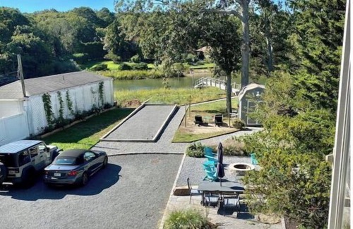 Mattituck House | Waterfront home with private dock & bocce court!