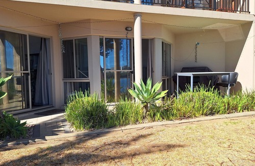 New Port Apartment | Waterfront Property with lovely views. Wake up to the dolphins and Swimming