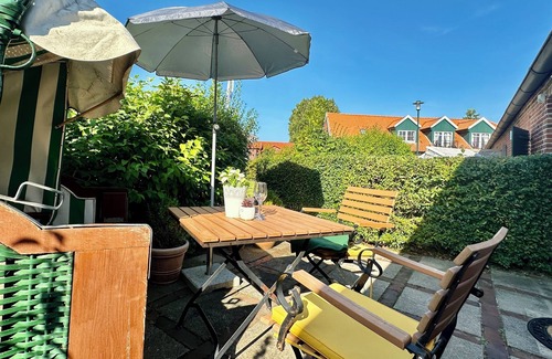 Altharlingersiel Apartment | Welcome to Lütt Kostall - your cozy retreat in the dreamlike Gulfhof