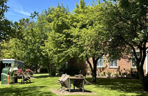 Altharlingersiel Apartment | Welcome to Lütt Kostall - your cozy retreat in the dreamlike Gulfhof