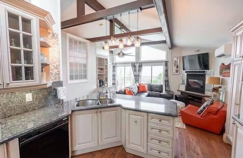 Tobermory House | Welcome to Sunset Cove — a serene waterfront cottage near Tobermory, where turquoise waters meet star-filled skies. Enjoy sunsets, Northern Lights, a private dock, and cozy nights by the fire. Your unforgettable escape awaits.