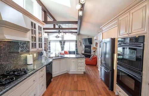 Tobermory House | Welcome to Sunset Cove — a serene waterfront cottage near Tobermory, where turquoise waters meet star-filled skies. Enjoy sunsets, Northern Lights, a private dock, and cozy nights by the fire. Your unforgettable escape awaits.