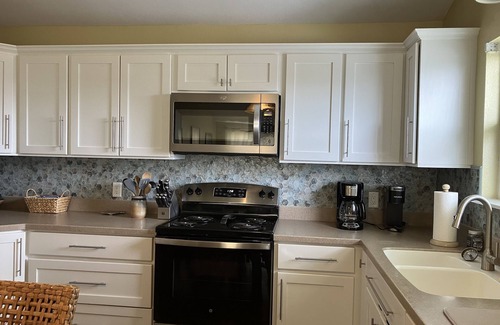 City-by-the Sea House | Welcome to The Lazy Bay | Canal Front Home with Boat Dock