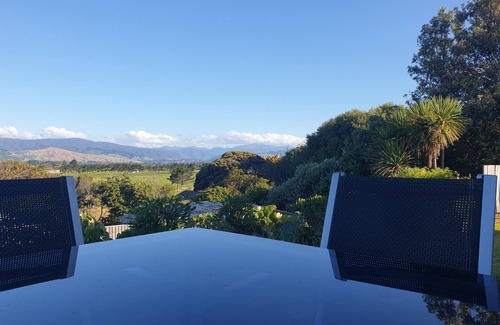 Otaki Beach House | Well presented bach with great views at Otaki Beach