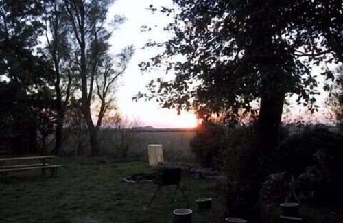 Neuharlingersiel House | Wonderful cottage with nature garden and fireplace, near ocean