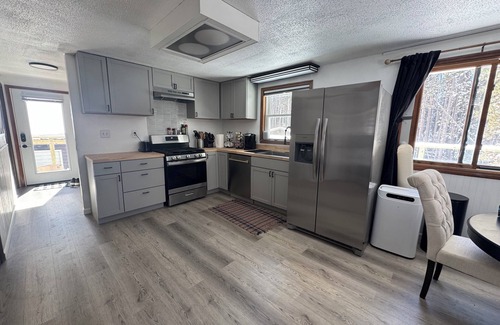 L'Anse House | Your Enchanting Escape to the UP - Central wooded retreat, waterfalls