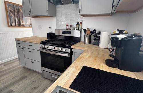 L'Anse House | Your Enchanting Escape to the UP - Central wooded retreat, waterfalls