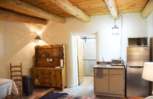 Nambe Pueblo House | Ysabel Adobe- Private Bedroom attached bathroom in century old adobe on 1 acre.