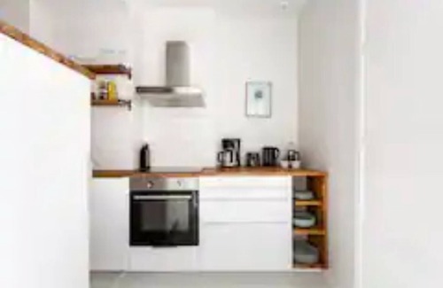 Alppiharju Apartment | Zen Apt with Garden in Trendy Kallio Neighborhood