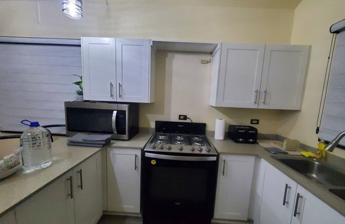 Portmore House | Zen at Phoenix 24hr security- Gated CommunitynLuxury & comfort in a modern space