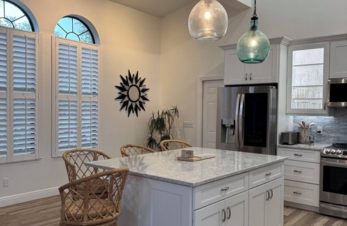 Hobe Sound House | Zephyr House in Zeus Park - Walk to Beach & Dining, Game Room, Screen Patio Boho