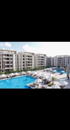 شاليه 2 غرفه مكيف جاردن ب قريه جراند هيلز الساحل الشمالي